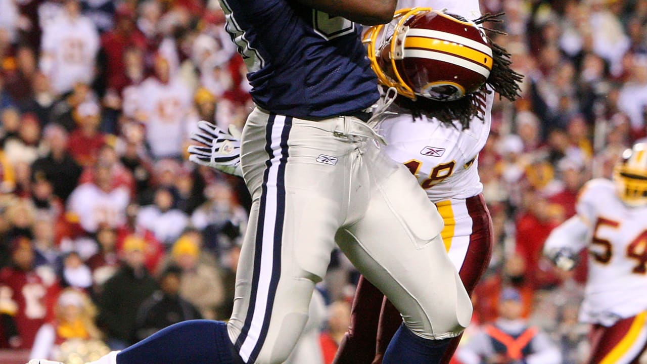 Chris Brown of the Tennessee Titans takes off as Bobby McCray 93