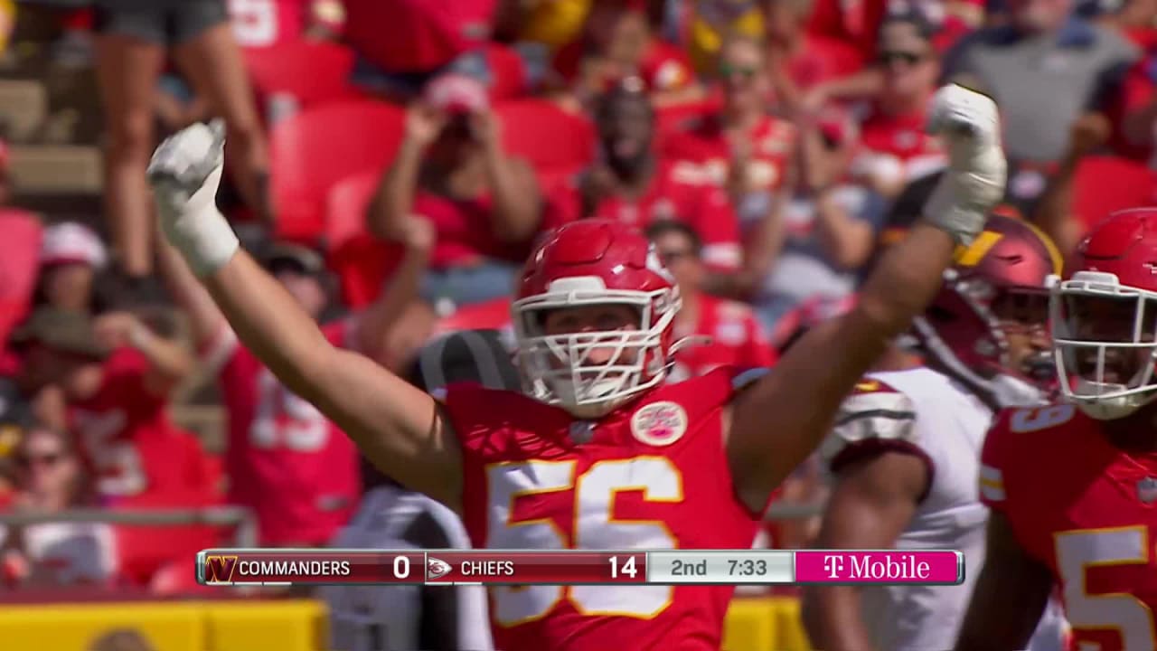 Kansas City Chiefs defensive end George Karlaftis overpowers two blockers  to sack Washington Commanders quarterback Carson Wentz