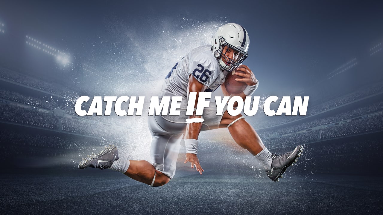 Download Saquon Barkley in action on the field Wallpaper