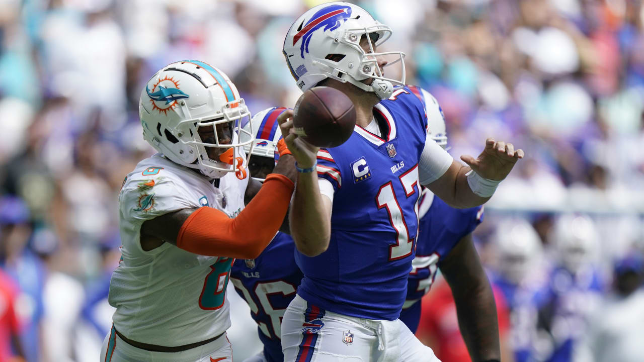 Miami Dolphins safety Jevon Holland (8) enters the field through the smoke  before an NFL football game against the Buffalo Bills, Sunday, Sept. 25,  2022 in Miami Gardens, Fla. The Dolphins defeat