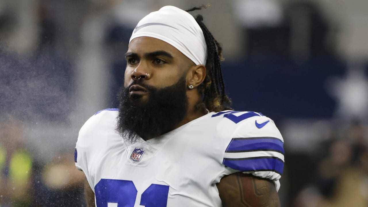 Dallas Cowboys NFL football first-round draft pick Ezekiel Elliott, poses  with his jersey in front of his locker at the team's training facility,  Friday, April 29, 2016, in Irving, Texas. (AP Photo/Tony