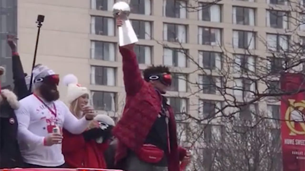 Fan Watches Chiefs' Super Bowl LIV Victory Parade from a Tree