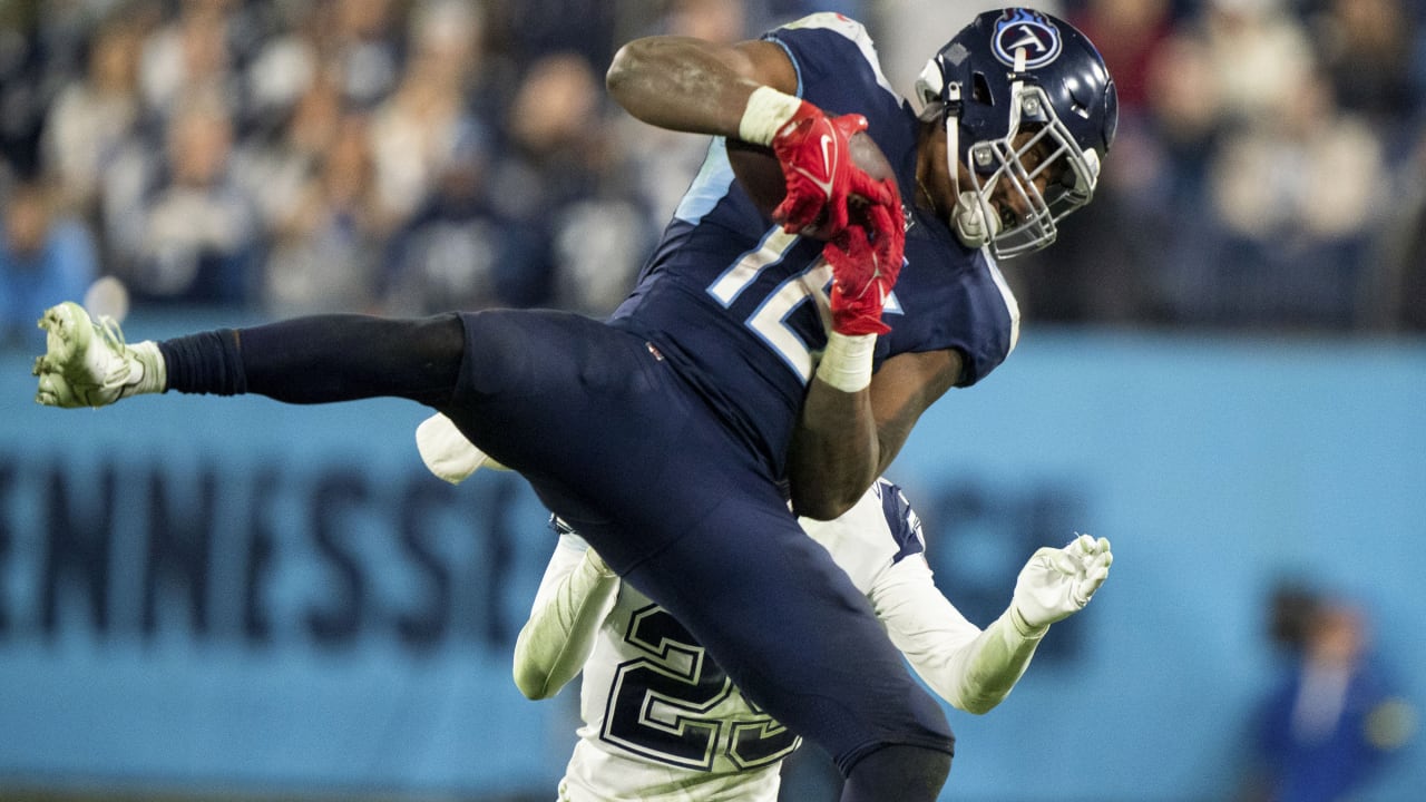 Titans' Treylon Burks takes brutal hit to facemask, somehow