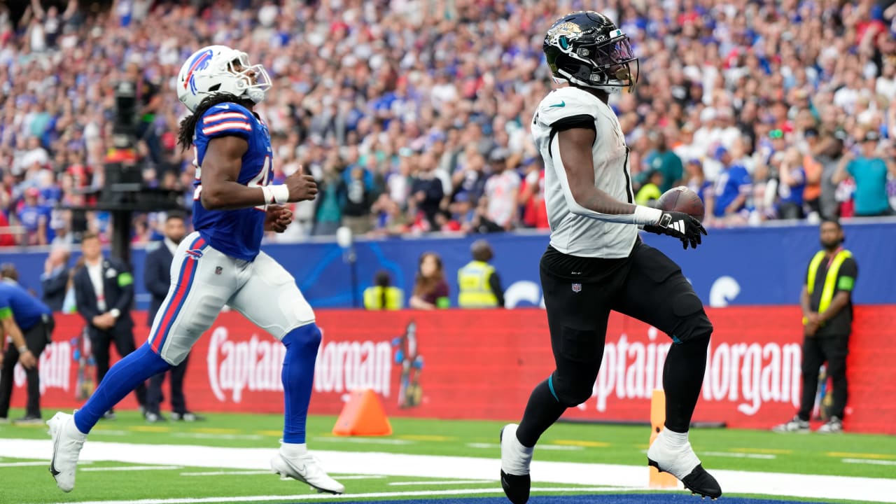 Fan runs on the field during Jaguars touchdown run