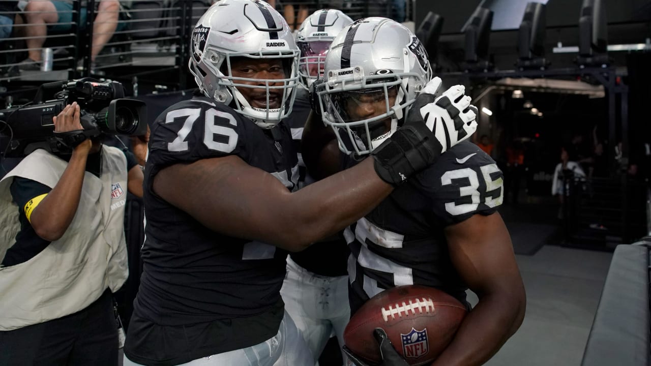 Las Vegas Raiders running back Zamir White (35) leaves the field