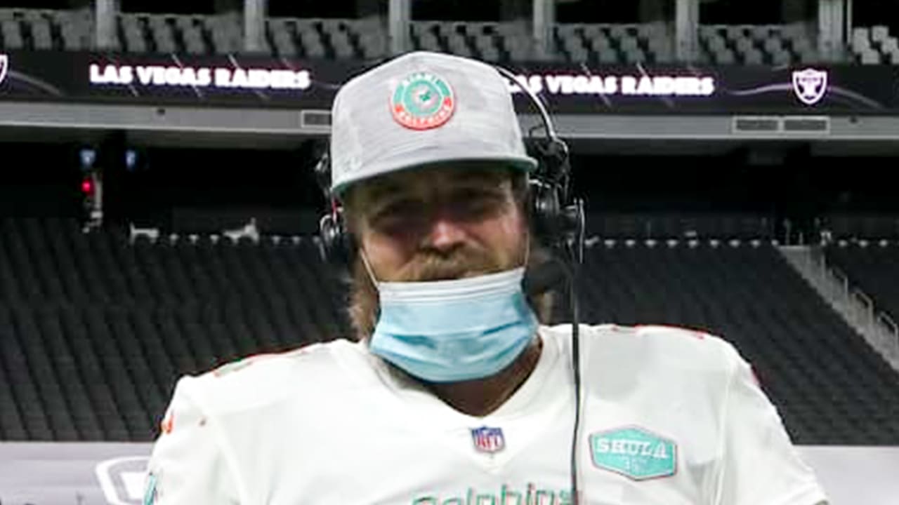 Miami Dolphins quarterback Ryan Fitzpatrick reacts to his team's wild