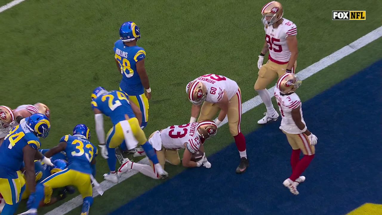 San Francisco 49ers running back Christian McCaffrey barges through a