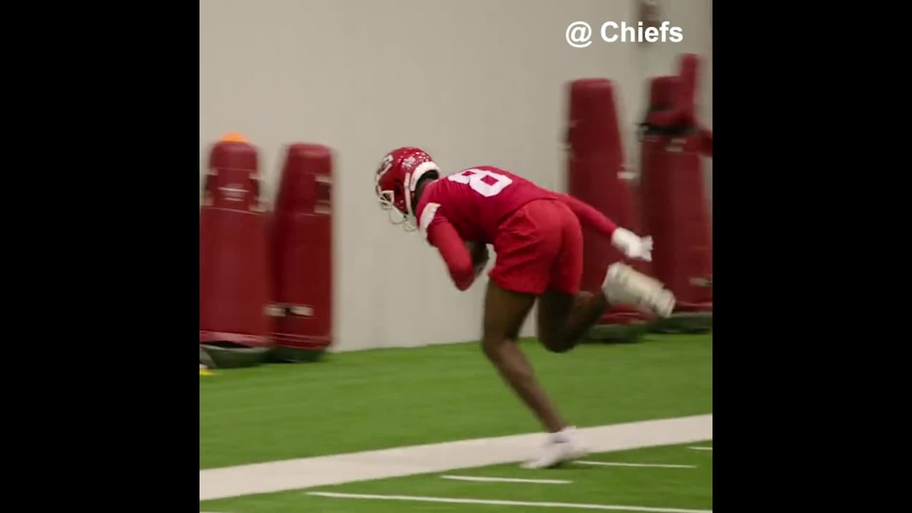 Kansas City Chiefs wide receiver Justyn Ross shoves defensive back away on  14-yard catch and run