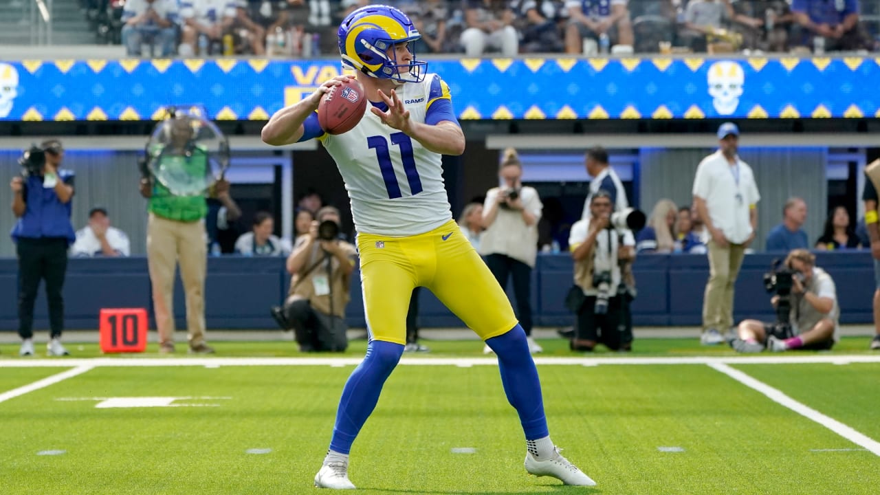 Los Angeles Rams punter Riley Dixon (11) throws a pass on a trick