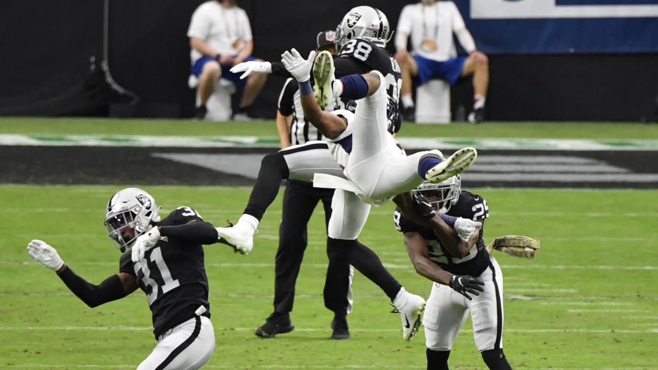 Las Vegas Raiders safety Jeff Heath reads Denver Broncos