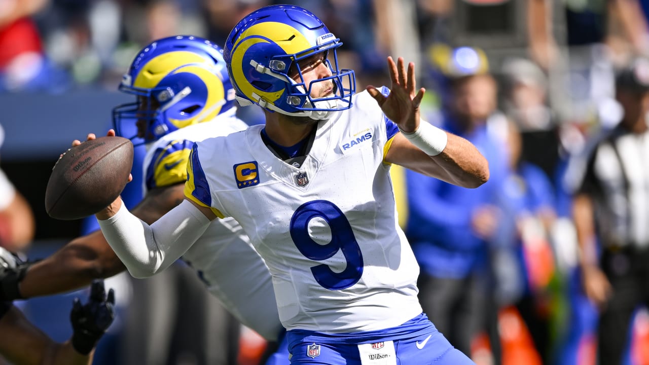 Los Angeles Rams quarterback Matthew Stafford unloads a 45-yard deep ball  to Rams wide receiver Tutu Atwell