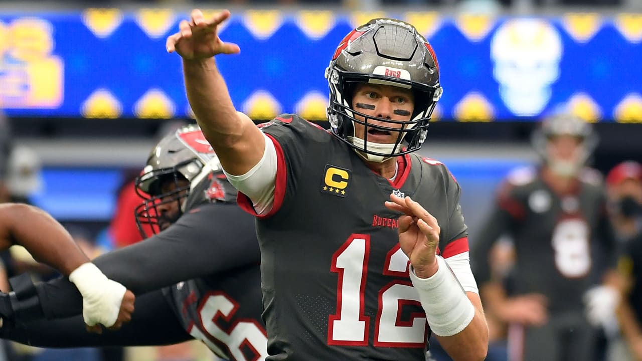 Tampa Bay Buccaneers quarterback Tom Brady rips a fastball through an airtight window to