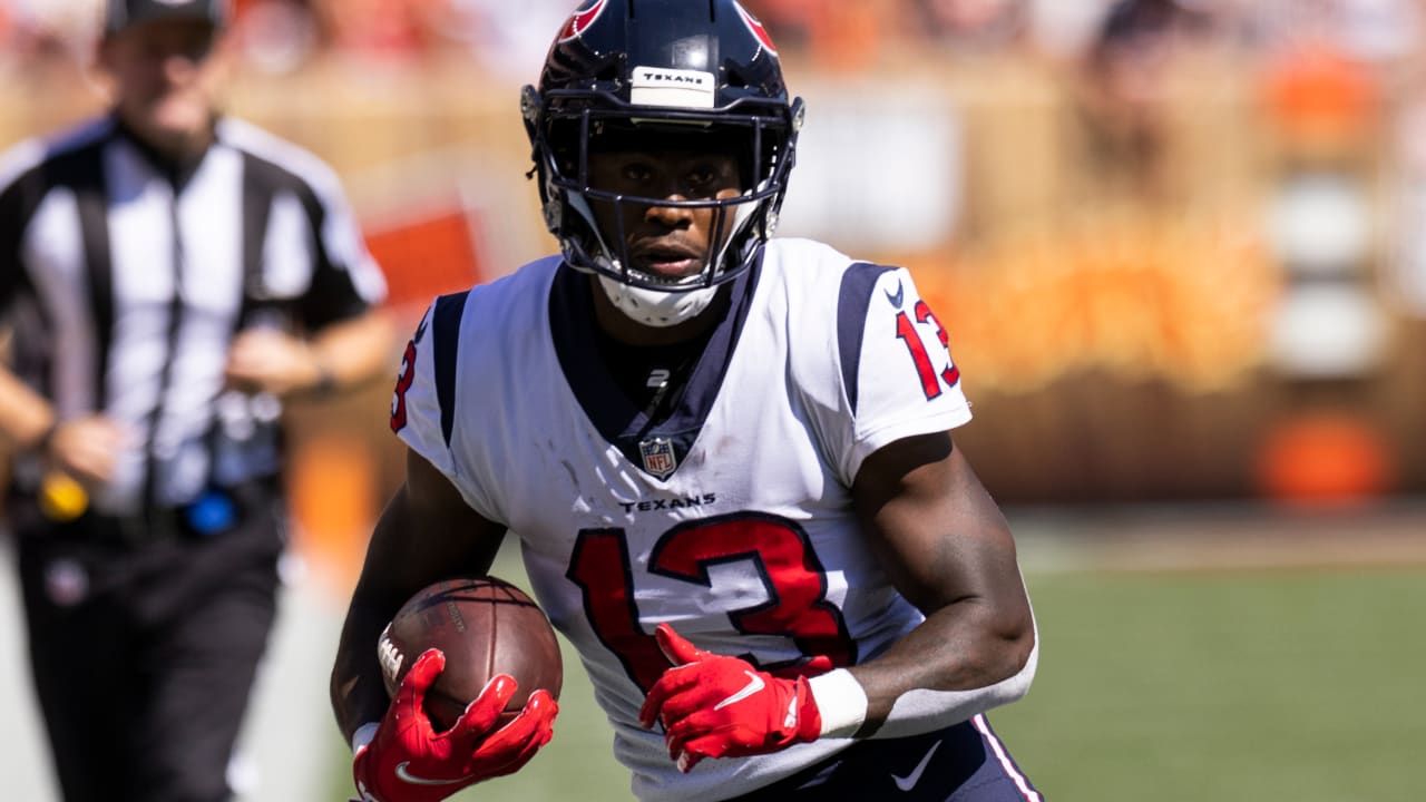 Houston Texans wide receiver Brandin Cooks (13) is flipped upside