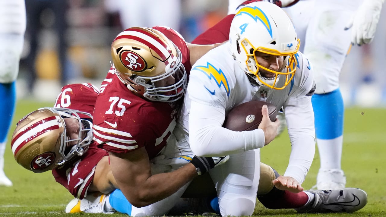 San Francisco 49ers defensive end Nick Bosa (97) sacks Los Angeles Chargers  quarterback Justin Herbert (10) during an NFL football game, Sunday,  Nov.13, 2022, in Santa Clara, Calif. (AP Photo/Scot Tucker Stock