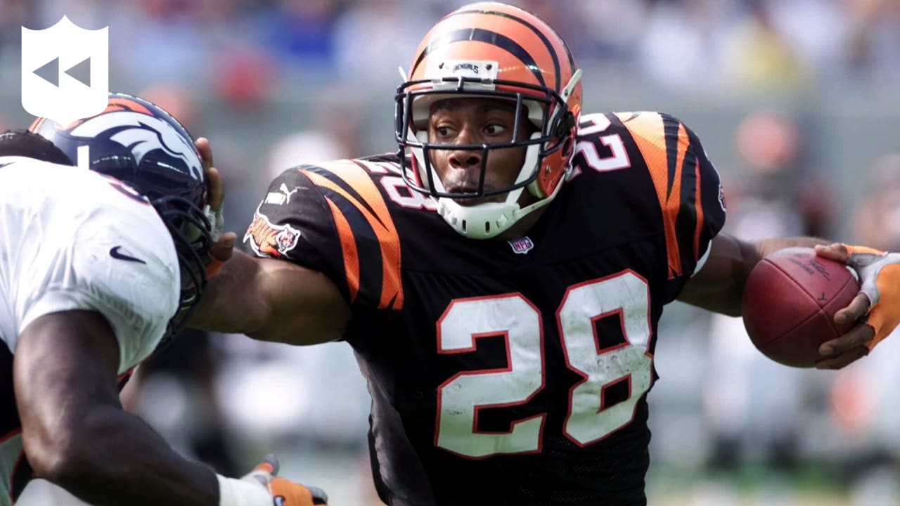 Cincinnati Bengals running back Corey Dillon (28) runs downfield with  linebacker Takeo Spikes, left, in pursuit, Wednesday, Aug. 1, 2001, at  training camp in Georgetown, Ky. Dillon is only expected to play