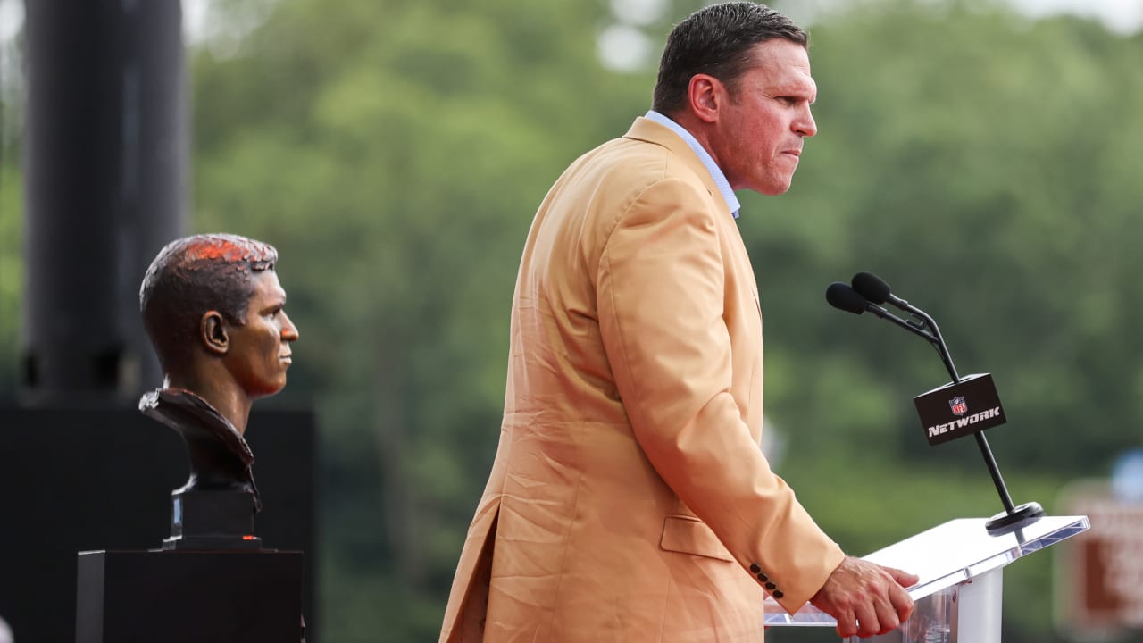 Former Jacksonville Jaguars offensive tackle Tony Boselli, center, stands  with members of his family after a ceremony, where he was presented with  his Pro Football Hall of Fame ring and had his