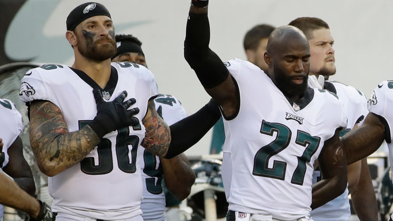 Former Philadelphia Eagles players participate in a ceremony