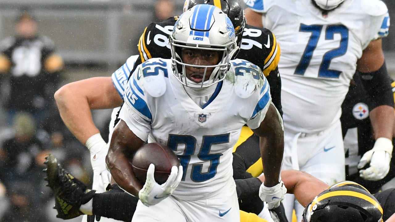 Detroit Lions running back Godwin Igwebuike (35) looks down the field after  a play during the second half of an NFL preseason football game between the Detroit  Lions and the Indianapolis Colts