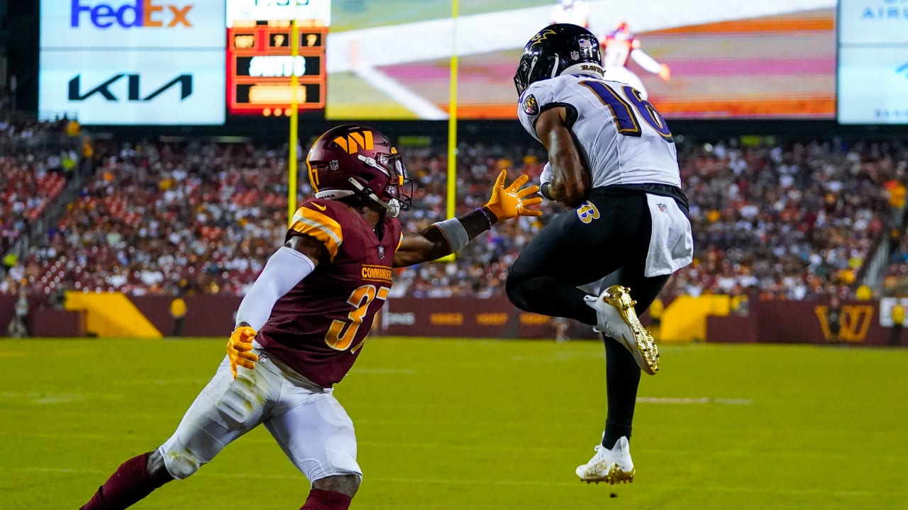 Baltimore Ravens quarterback Josh Johnson and wide receiver Tylan