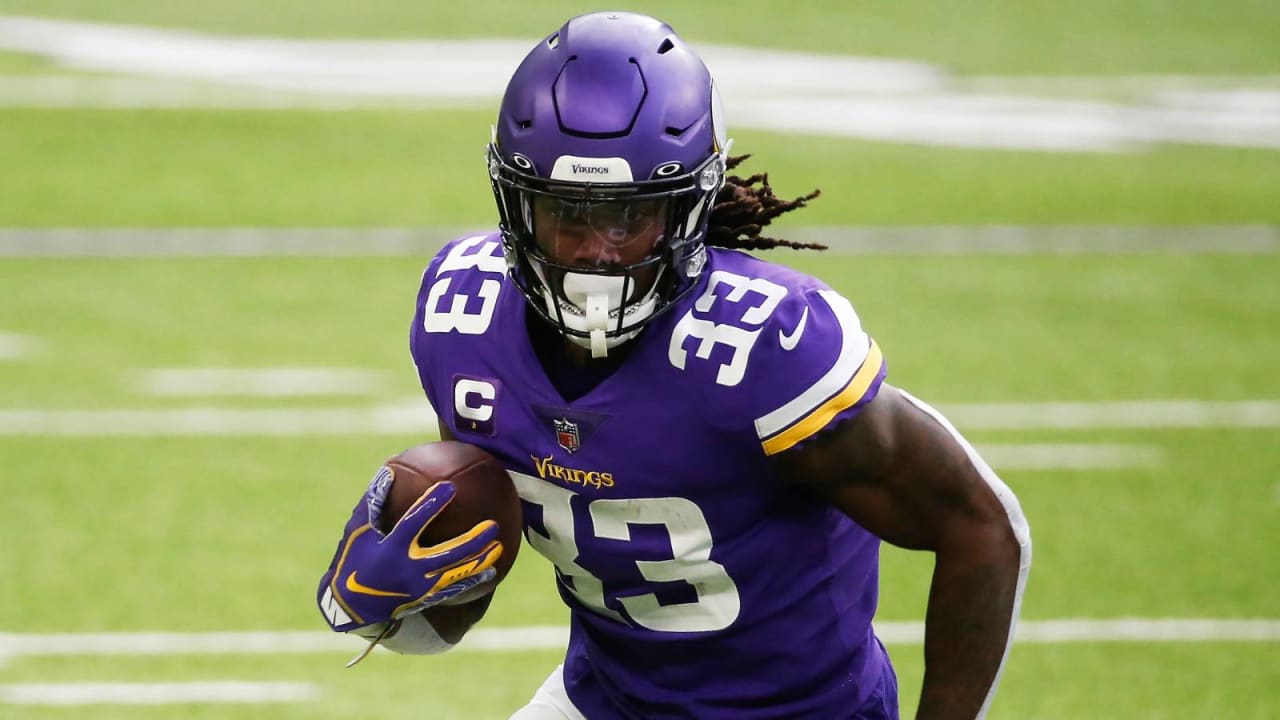 Dalvin Cook of the Minnesota Vikings carries the ball against the