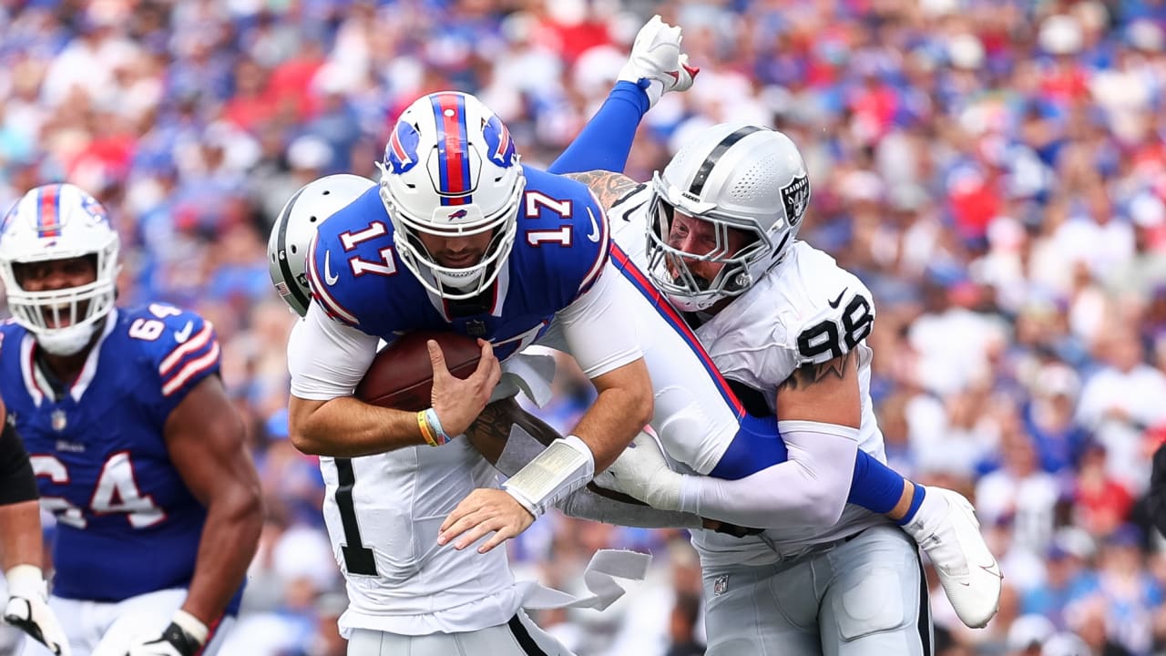 Josh Allen attempts to hurdle Raiders' Marcus Epps in Buffalo Bills' win  over Las Vegas with his crotch catching the safety in the face just days  after admitting he must 'play smarter'