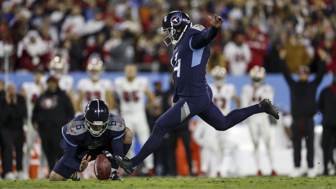 Tennessee Titans kicker Randy Bullock (14) boots a 44-yard field goal  against the Miami Dolphins in the second half of an NFL football game  Sunday, Jan. 2, 2022, in Nashville, Tenn. (AP