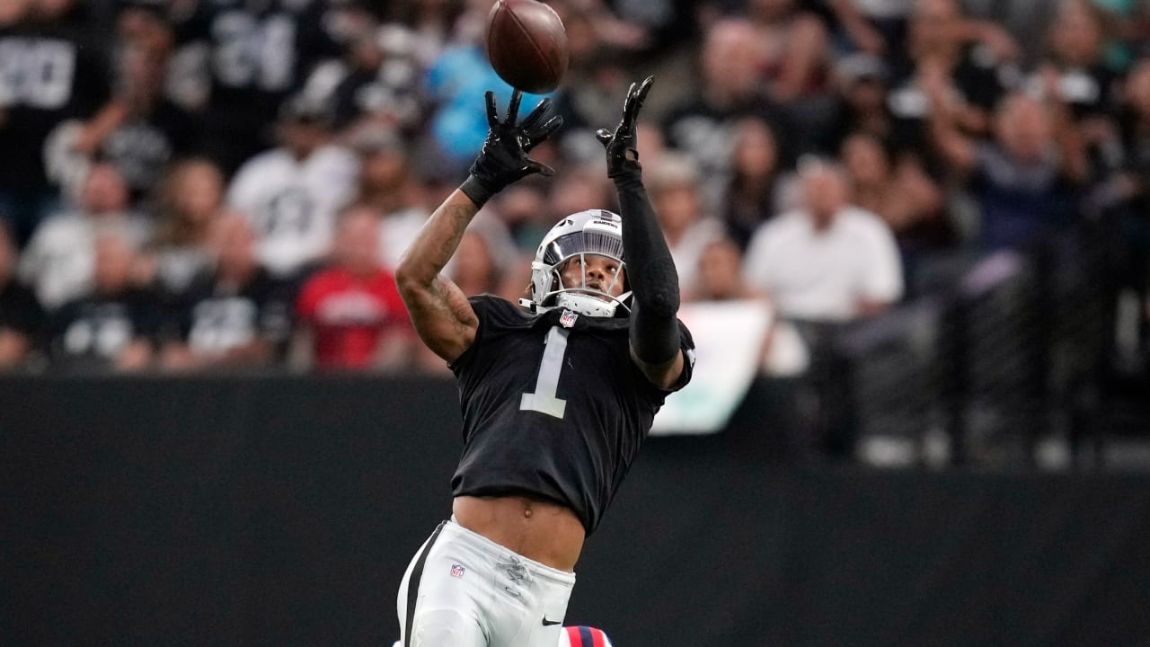 Las Vegas Raiders wide receiver Tyron Johnson tracks down Raiders  quarterback Chase Garbers' deep shot for a 45-yard grab