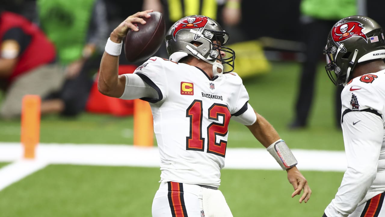 Tampa Bay Buccaneers quarterback Tom Brady rushes for two-yard