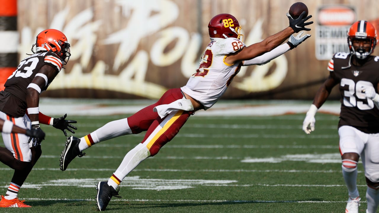 Washington Commanders tight end Logan Thomas (82) runs during an