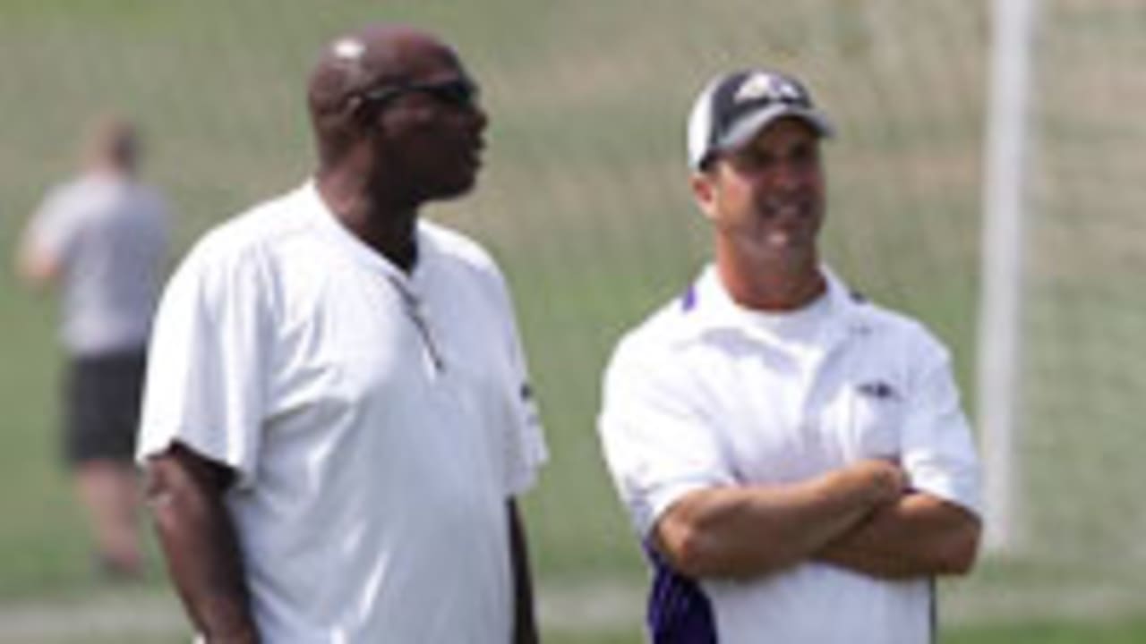 ozzie-newsome-john-harbaugh-140415-spot.jpg