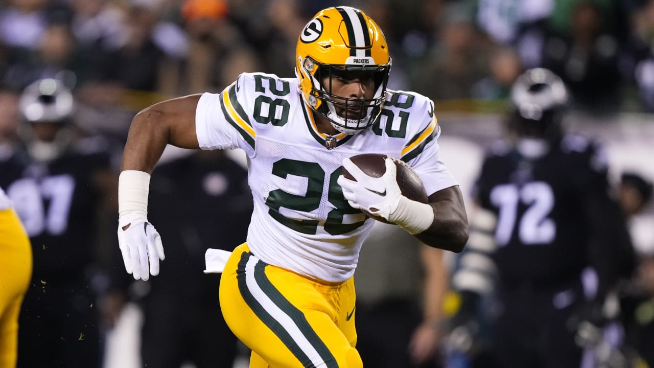 Green Bay Packers running back A.J. Dillon gets the Packers on the