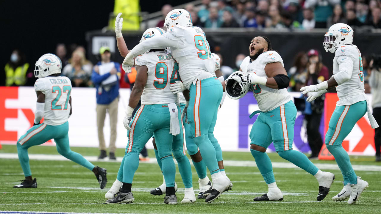 Miami Dolphins defensive lineman Christian Wilkins flies around edge to ...