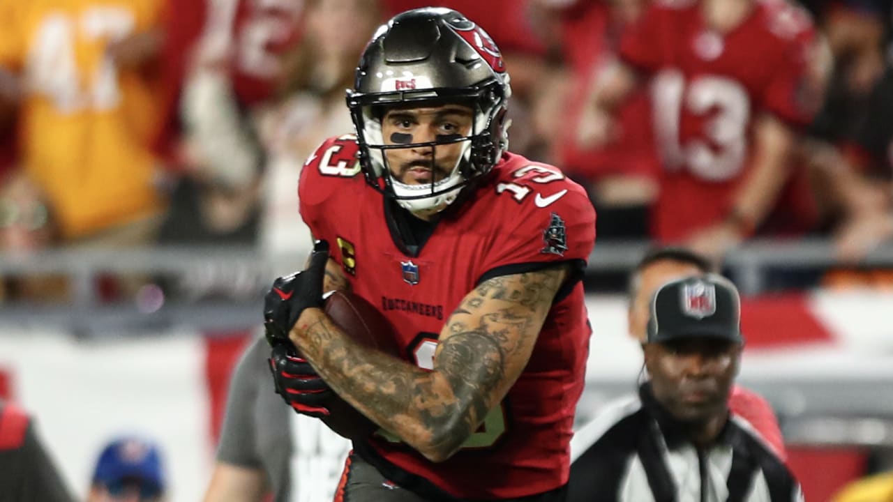 Tampa Bay Buccaneers wide receiver Mike Evans (13) points to a fan after  catching a touchdown pass during an NFL football game against the Chicago  Bears, Sunday, Sept. 17, 2023, in Tampa