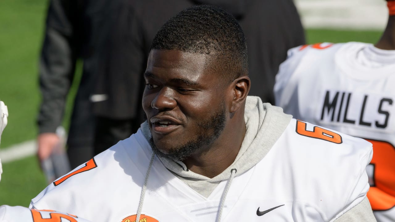 Cincinnati Bengals offensive tackle D'Ante Smith looks on during a