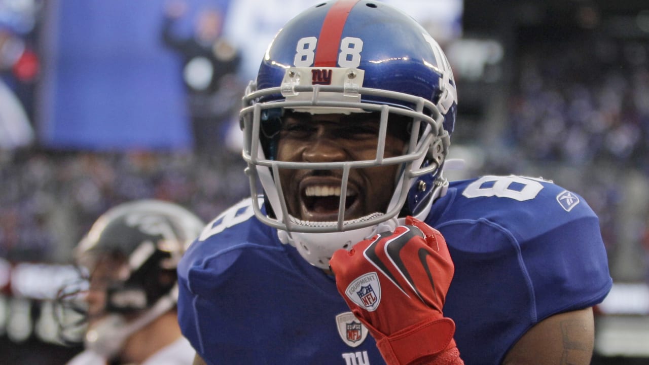 New York Giants Mario Manningham (82) comes down with an Eli Manning pass  in the fourth quarter as San Francisco 49ers Tramaine (26) defends in the NFC  Championship at Candlestick Park in