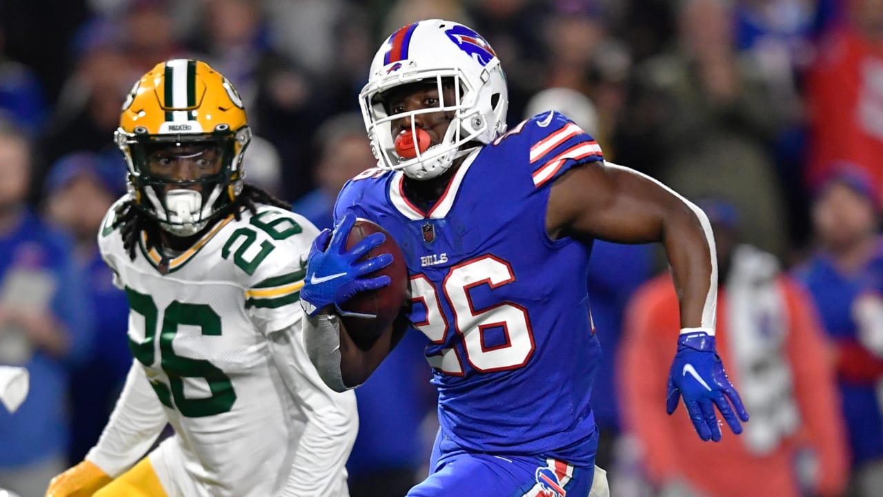 Buffalo Bills running back Devin Singletary (26) runs with the ball during  the first half of an NFL football game against the Pittsburgh Steelers in  Orchard Park, N.Y., Sunday, Oct. 9, 2022. (