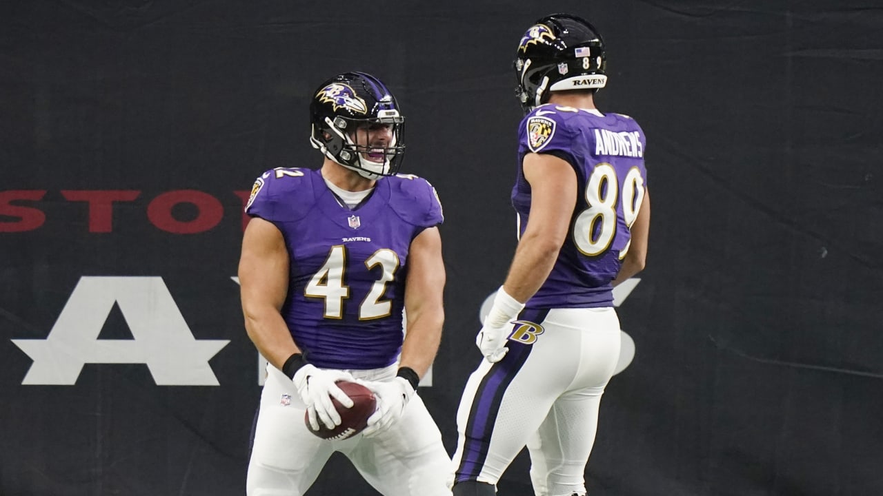 Baltimore Ravens fullback Patrick Ricard scoops a low throw from