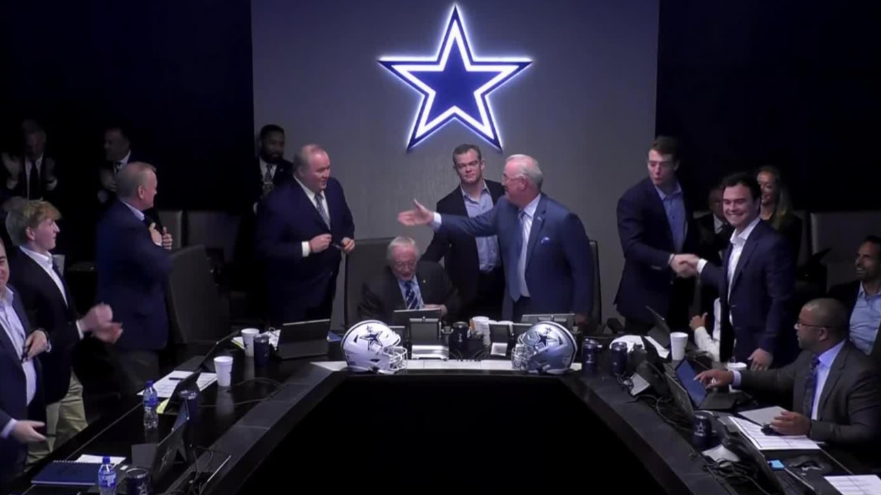 Dallas Cowboys owner Jerry Jones, COO Stephen Jones, head coach Mike  McCarthy celebrate in draft room during first round