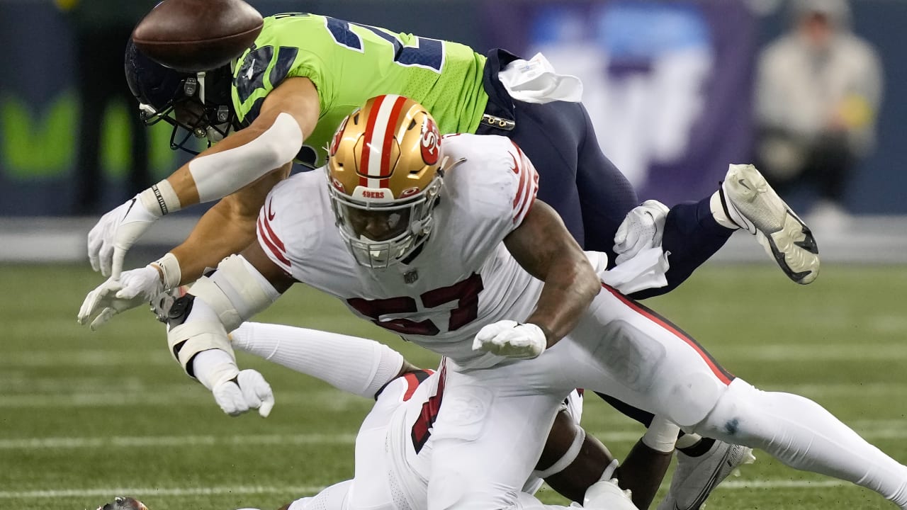 San Francisco 49ers linebacker Dre Greenlaw (57) runs onto the field during  an NFL football game against the New York Giants, Thursday, Sept. 21, 2023,  in Santa Clara, Calif. (AP Photo/Scot Tucker