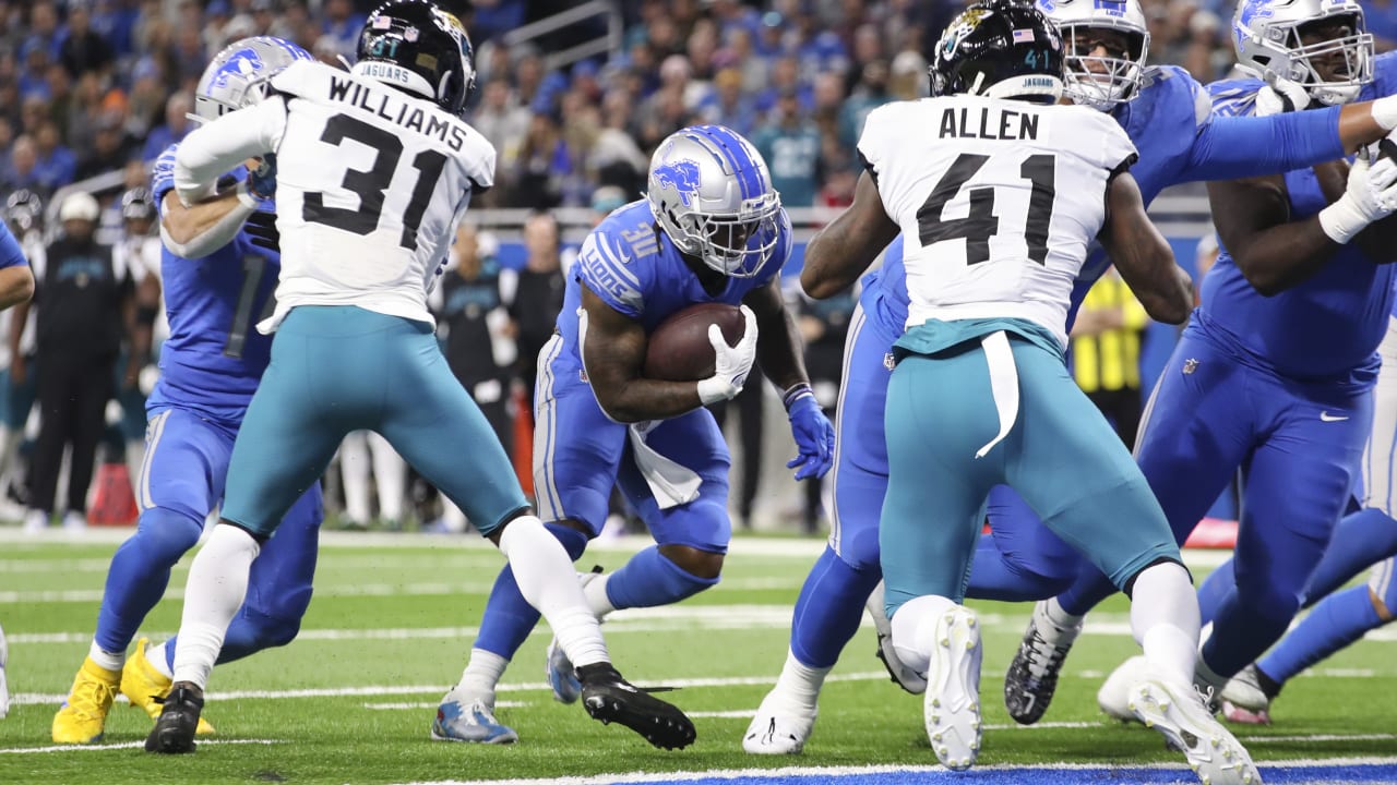 Detroit Lions running back Jamaal Williams (30) celebrates after scoring a  touchdown during the first half of an NFL football game against the New  York Giants, Sunday, Nov. 20, 2022, in East