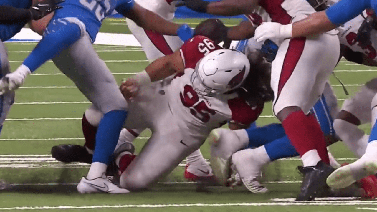 Arizona Cardinals defensive tackle Leki Fotu (95) looks up at a