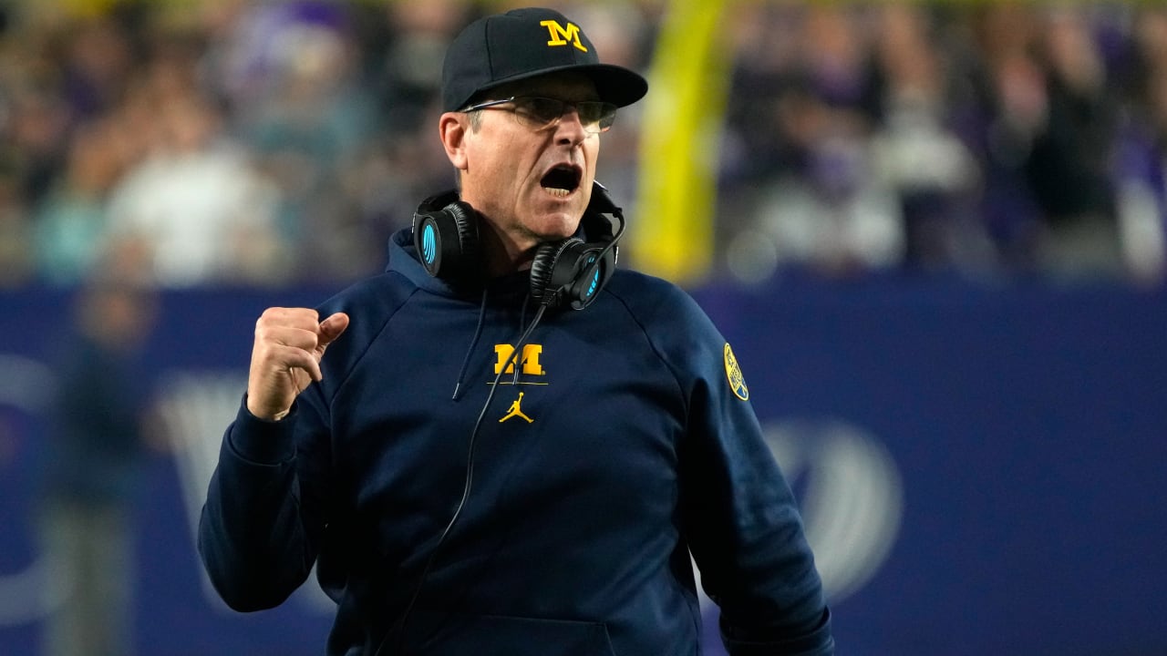 Jim Harbaugh calls Michigan president to say he's staying