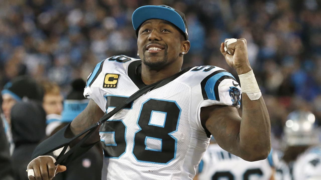 Carolina Panthers linebacker Thomas Davis lifts the NFC