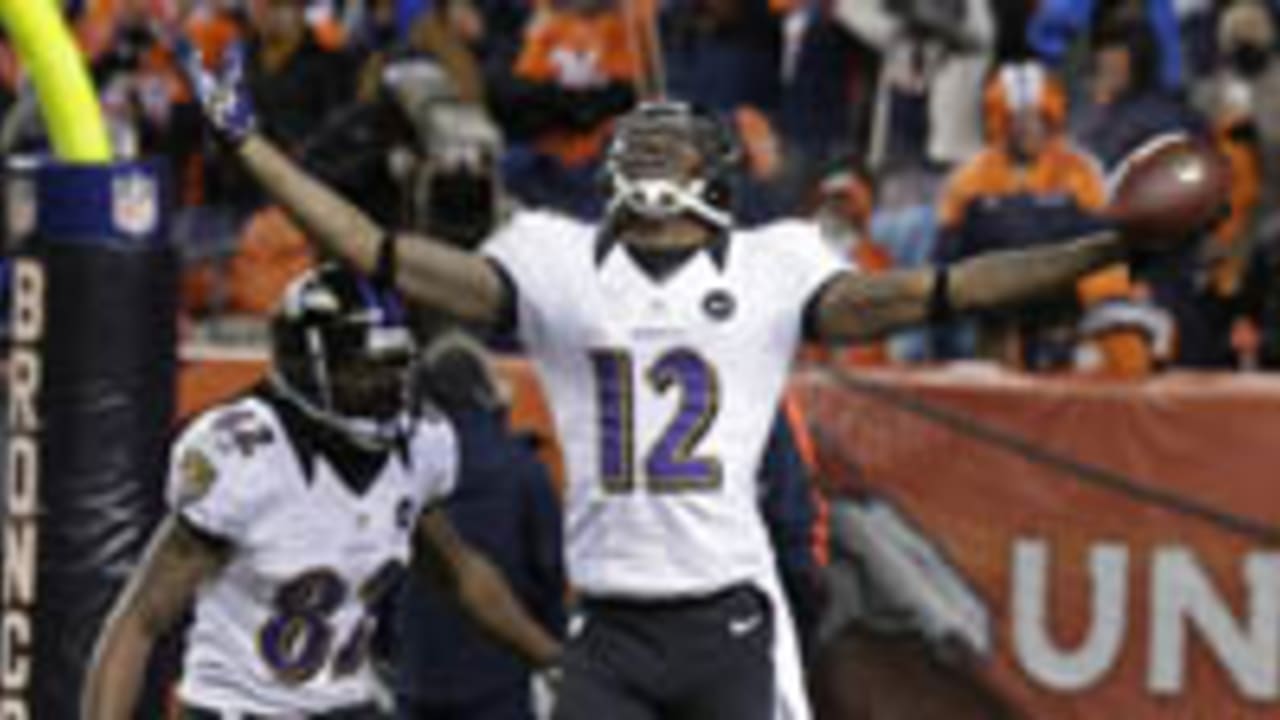 Denver Broncos wide receiver Trindon Holliday (11) returns a kickoff 23  yards during first quarter action against the Baltimore Ravens in the NFL  AFC Divisional Playoff game at Sports Authority Field in