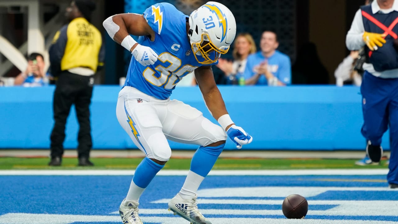 Los Angeles Chargers running back Austin Ekeler muscles through contact