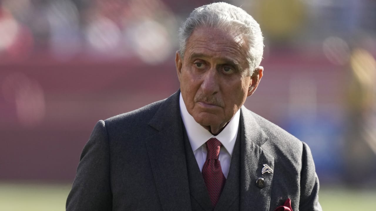 Atlanta Falcons owner Arthur M. Blank watches a replay of San