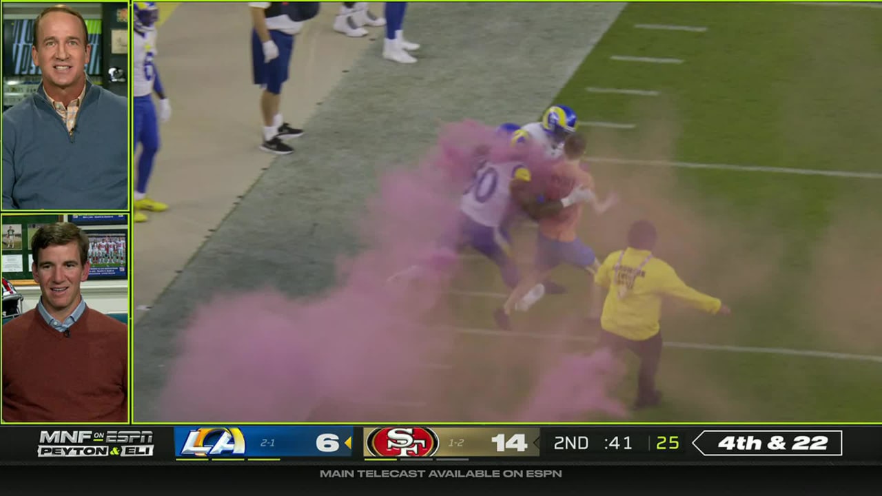 Peyton and Eli Manning Commentate as Rams Players Tackle Streaker