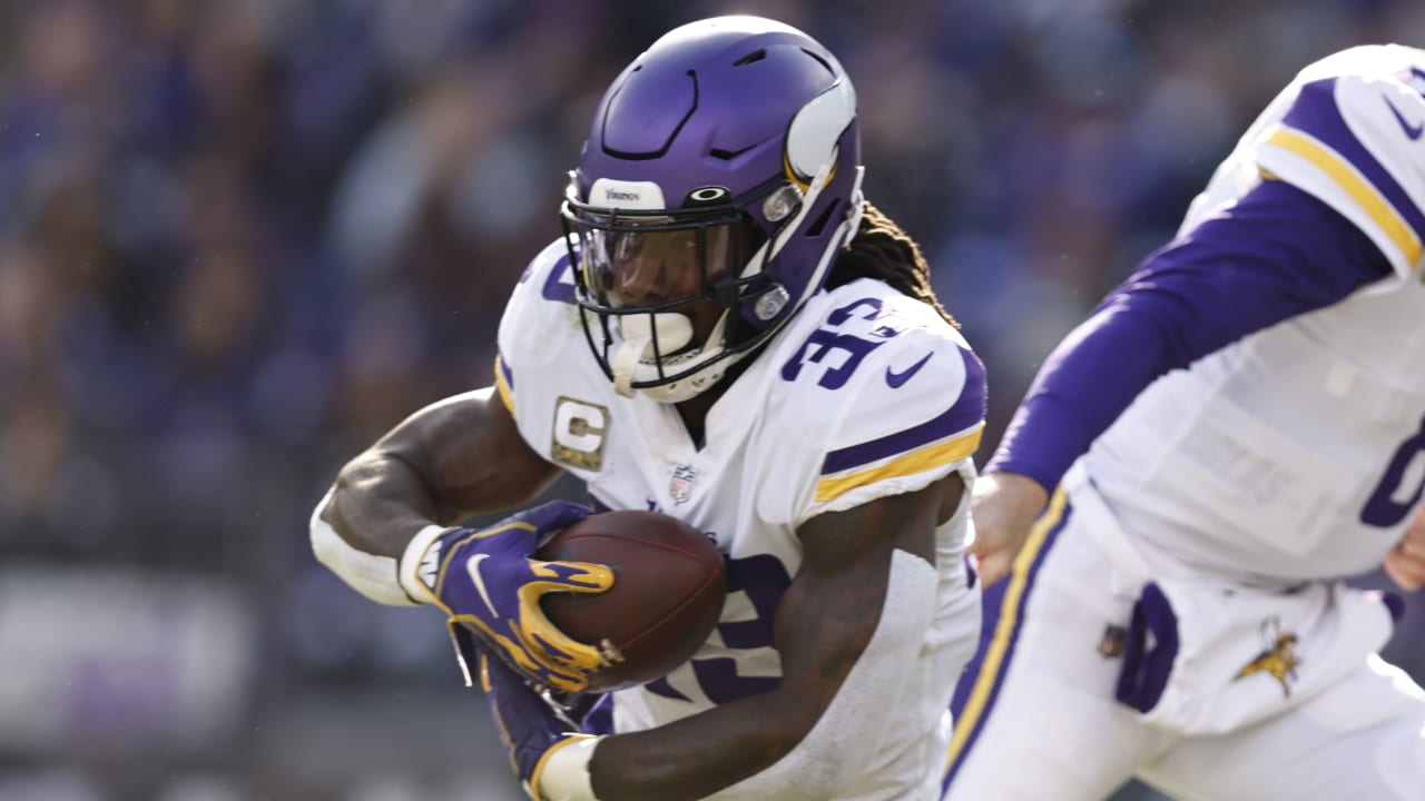 LANDOVER, MD - NOVEMBER 06: Minnesota Vikings running back Dalvin Cook (4)  reacts after a touchdown during the NFL game between the Minnesota Vikings  and the Washington Commanders on November 6, 2022