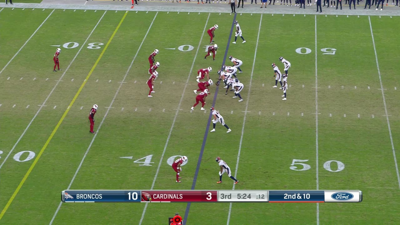 Denver Broncos quarterback Jarrett Stidham keeps it himself for a quick