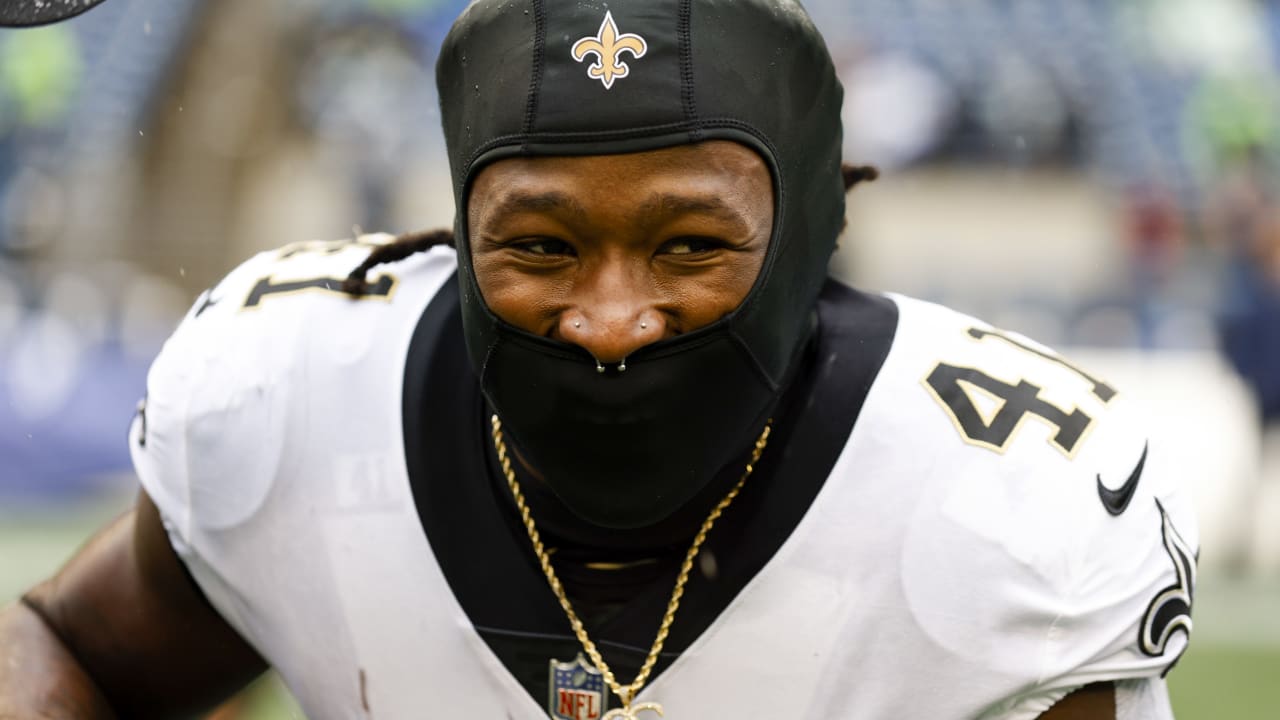 New York Jets running back Michael Carter (32) warms up before taking on  the Miami Dolphins during an NFL football game Sunday, Oct. 9, 2022, in  East Rutherford, N.J. (AP Photo/Adam Hunger